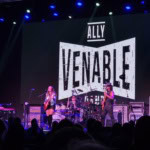 Ally Venable performing live at the Eureka Springs Blues Festival 2026, showcasing talented blues mu.