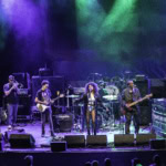 A lively blues band performing on stage at Eureka Springs Blues Festival 2026.