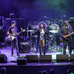 A lively blues band performing on stage at Eureka Springs Blues Festival 2026.