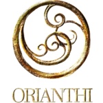 Eureka Springs Oranth logo with decorative gold swirl design, blues festival in Arkansas.