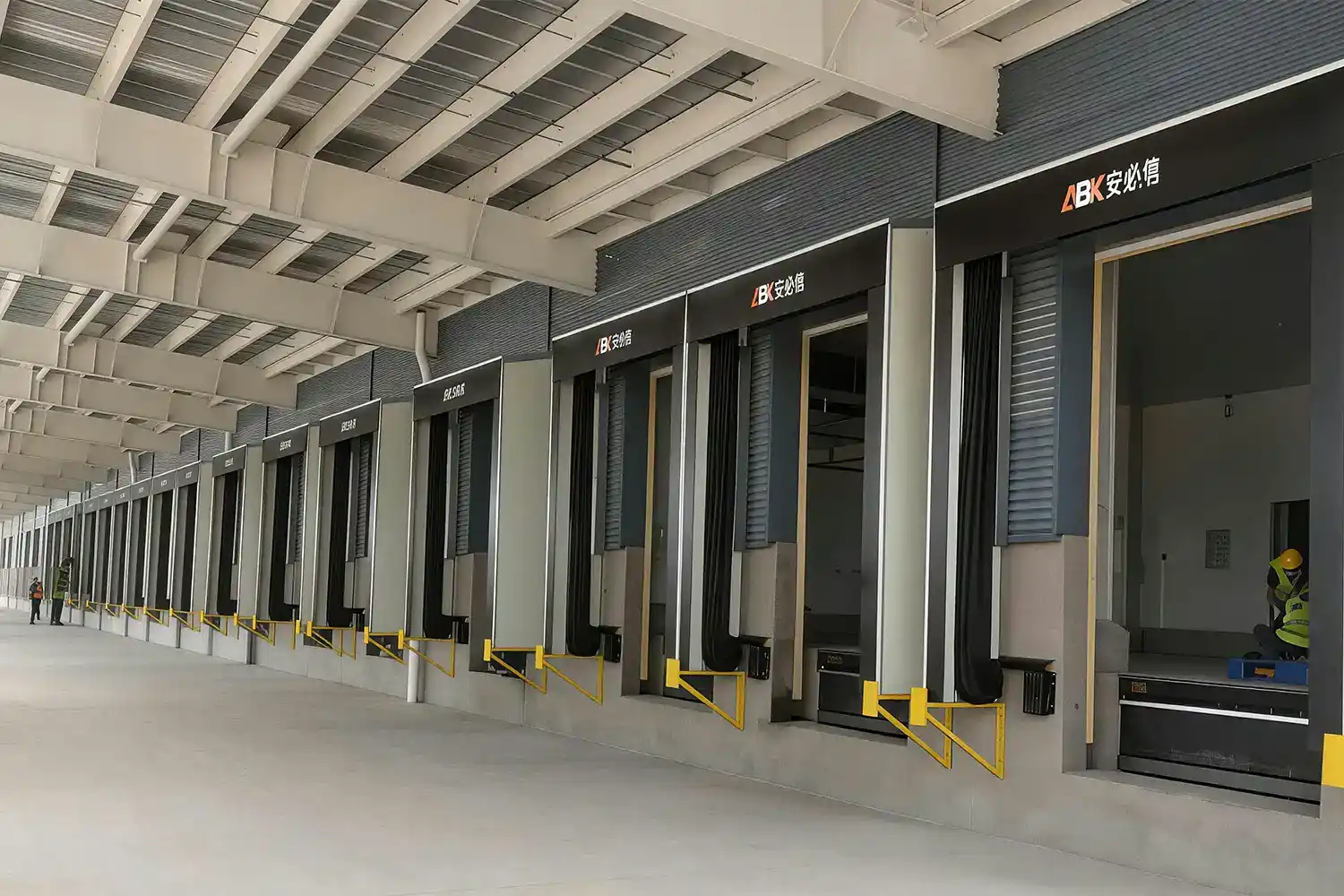 Complete loading dock systems featuring ABX hydraulic dock levelers and heavy-duty dock seals for efficient warehouse operations.