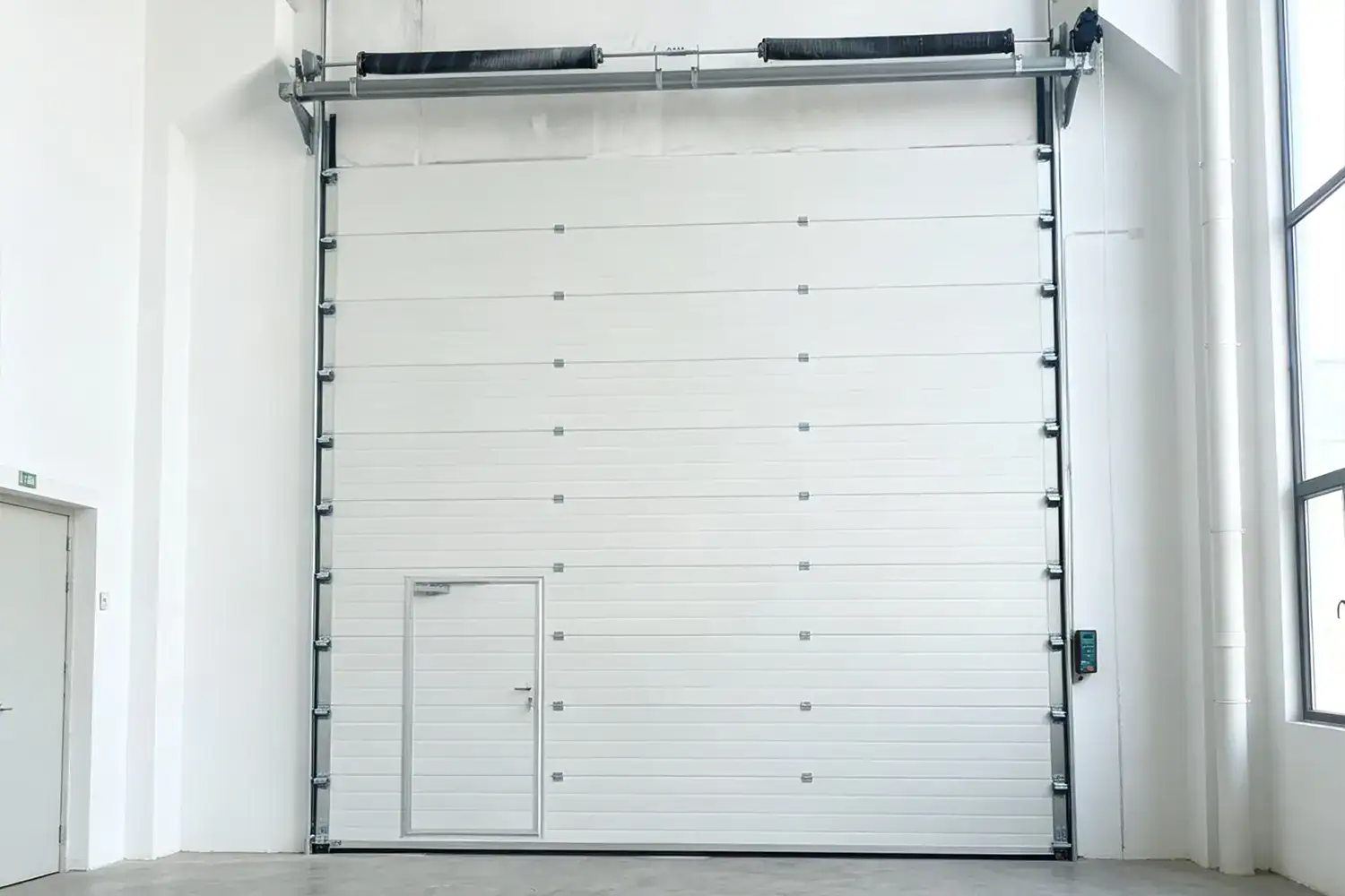 ANSI DASMA compliant heavy duty insulated sectional freezer warehouse door for US industrial projects