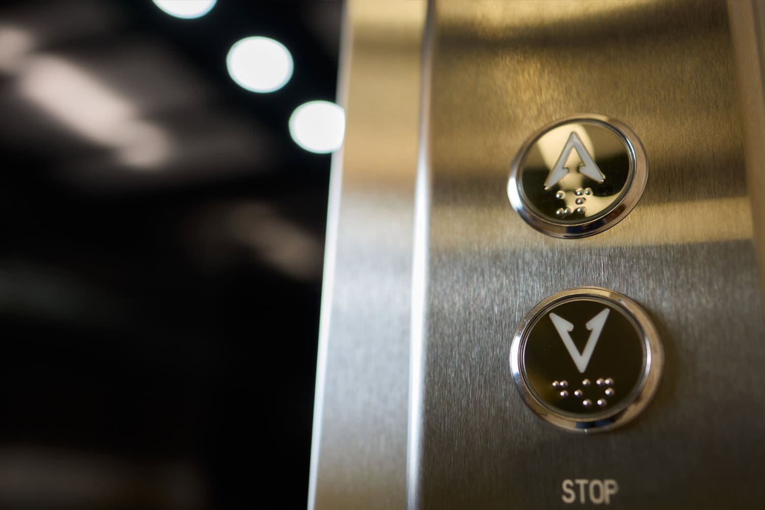 Close-up of elevator floor selection and control buttons
