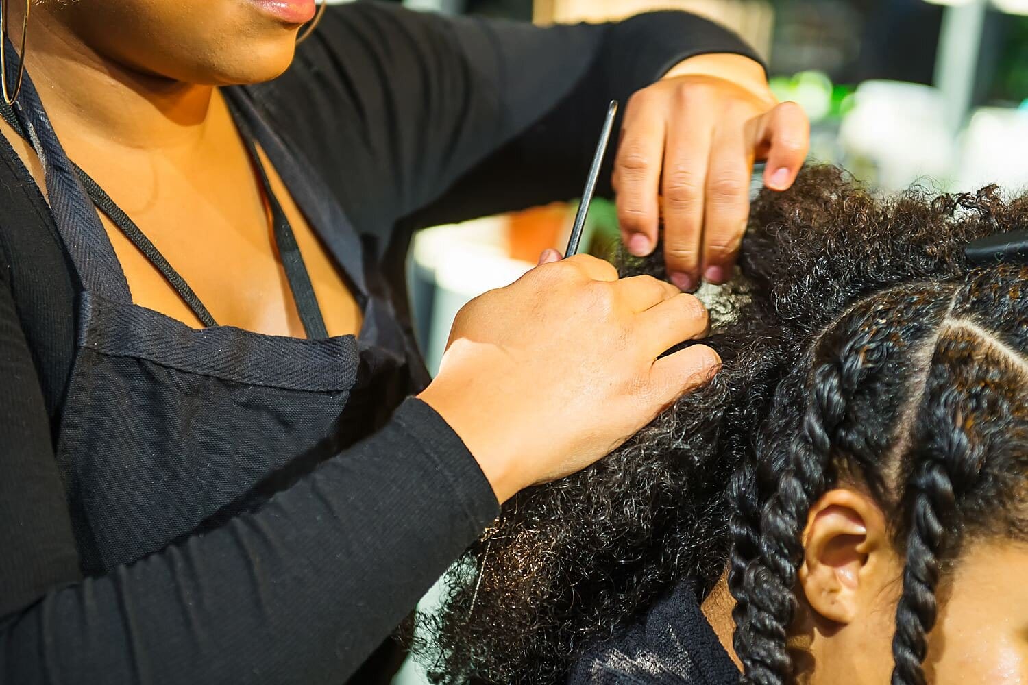 Close up african hairstylist braided hair of afro Sénégal