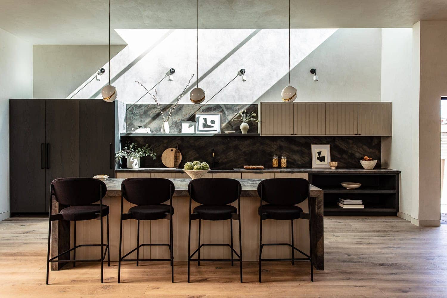 Contemporary kitchen design with minimalist cabinetry and natural light.