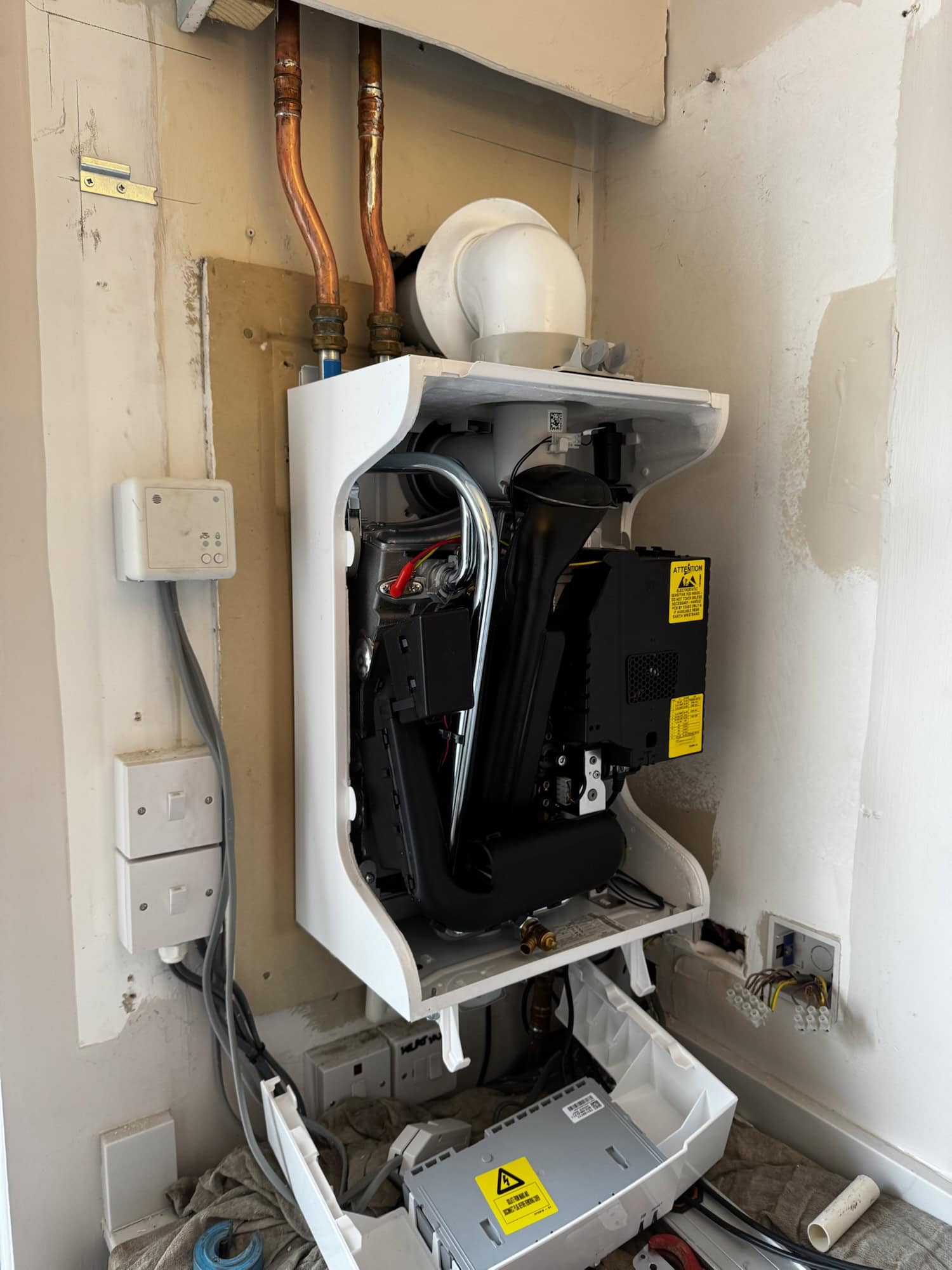gas boiler being serviced by gas safe engineer in glasgow.
