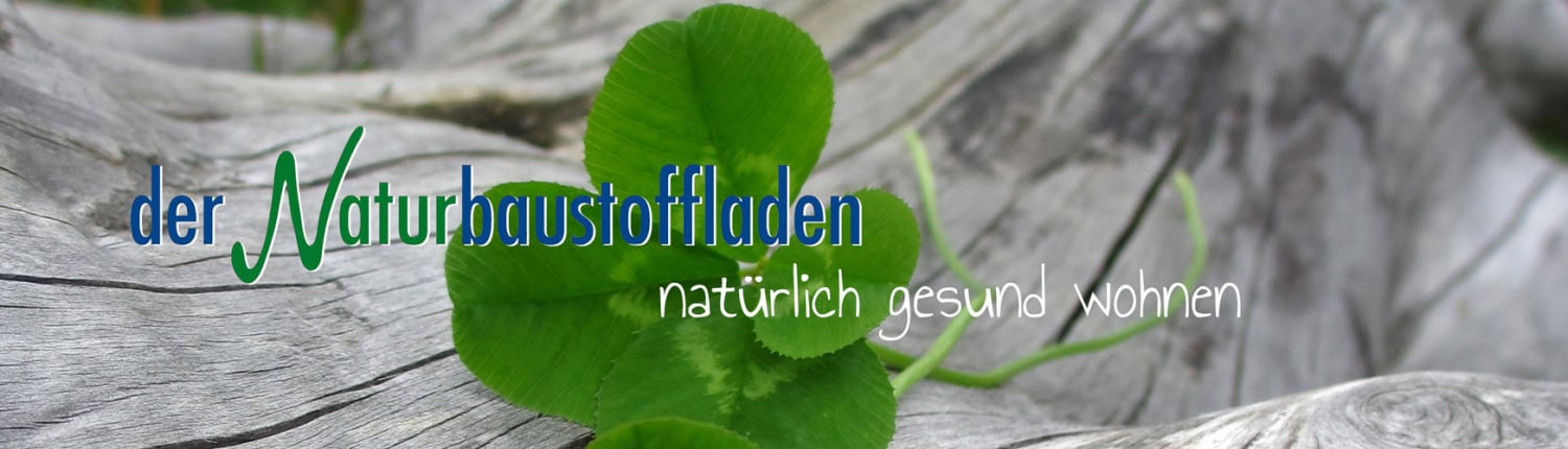 Banner mit grüner Blattpflanze vor grauer Holzstruktur und Schriftzug „der Naturbaustoffladen – natürlich gesund wohnen“.