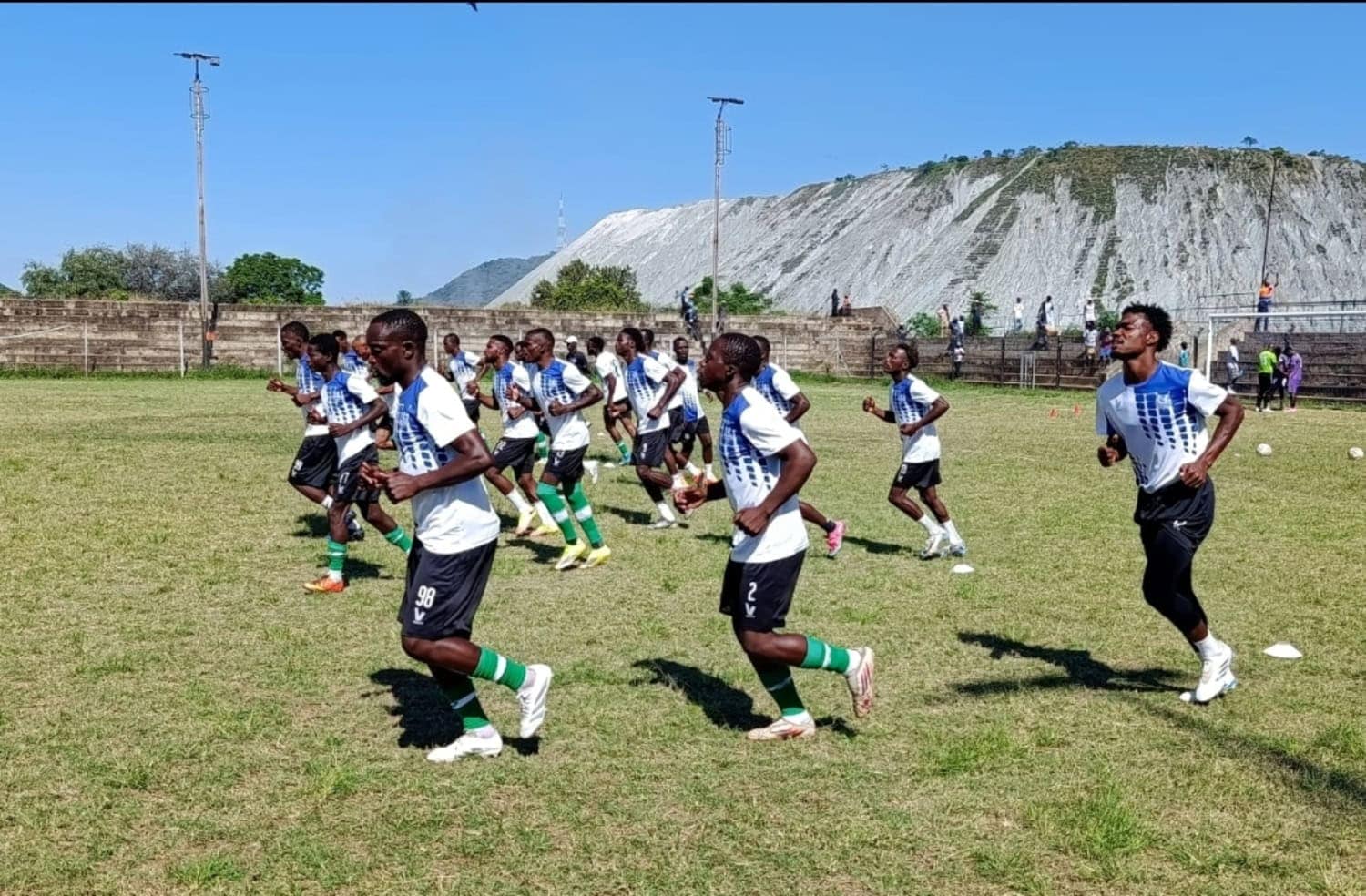 Blanket Mine FC warming up at Maglas Stadium.