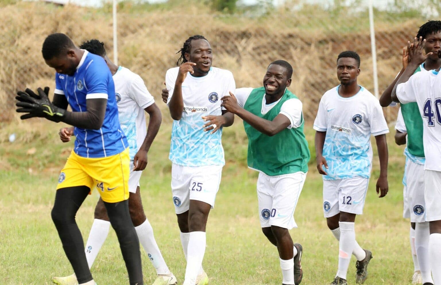 Evans Katema celebrating with Kwekwe United teammates