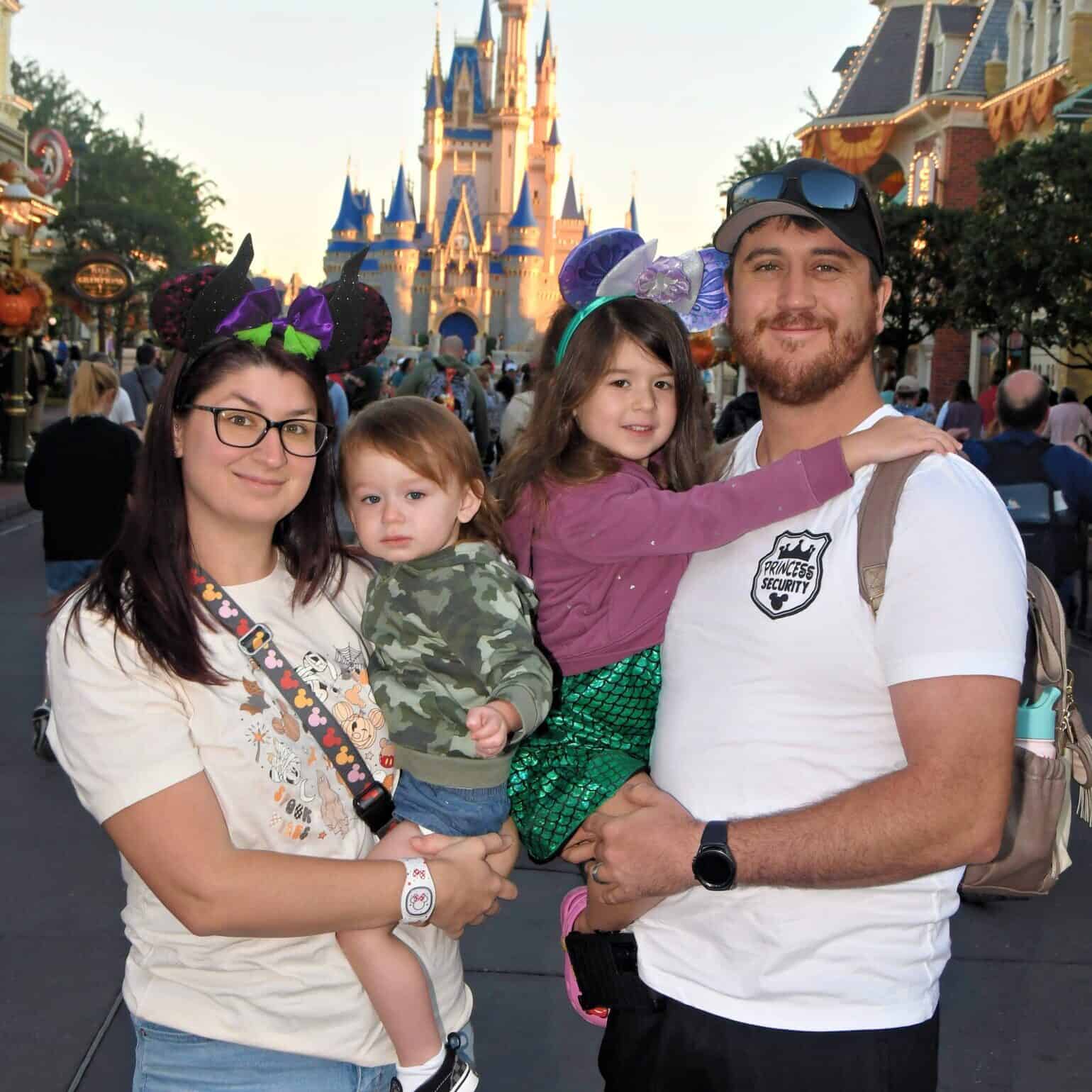 Colorful Disney family at Magic Kingdom in Orlando, Florida.