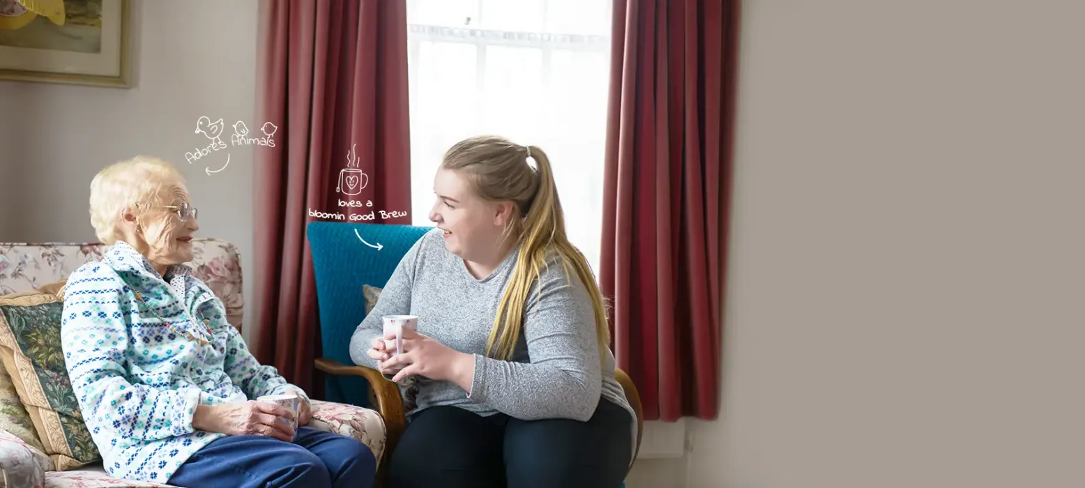 The Great Care Company Carer and client laughing and smiling