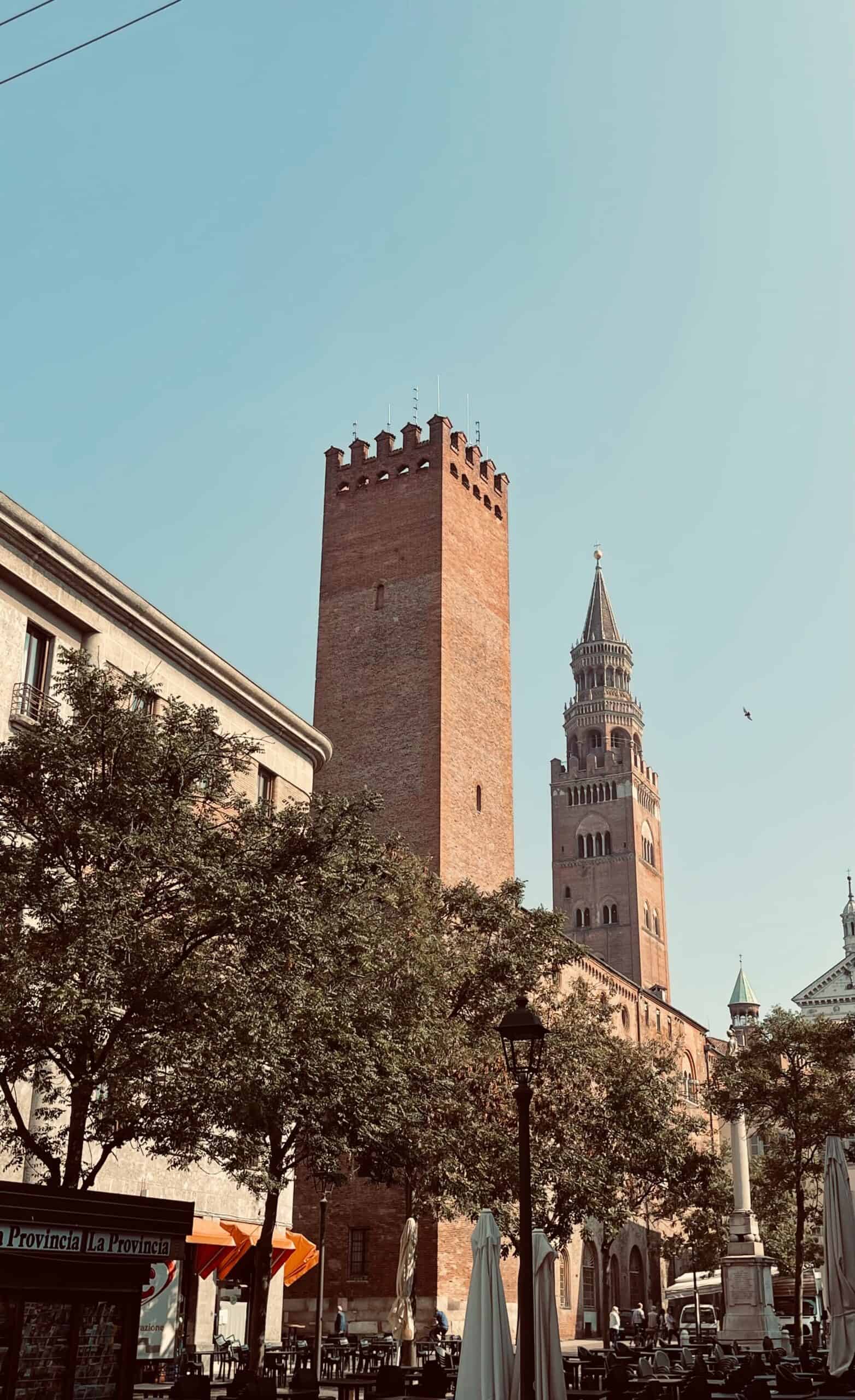 a tall tower with a clock on the top of it