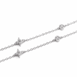 Close-up of the silver Valenne Clover Choker showing moissanite bezel stations and clover motifs