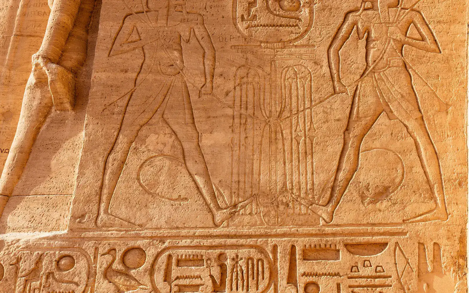 Carved prisoners and royal symbols at Abu Simbel Temple
