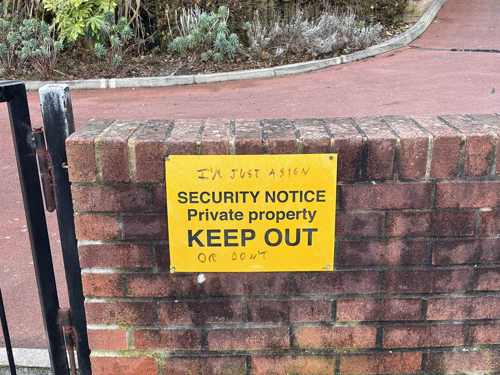 Keep out sign with graffiti