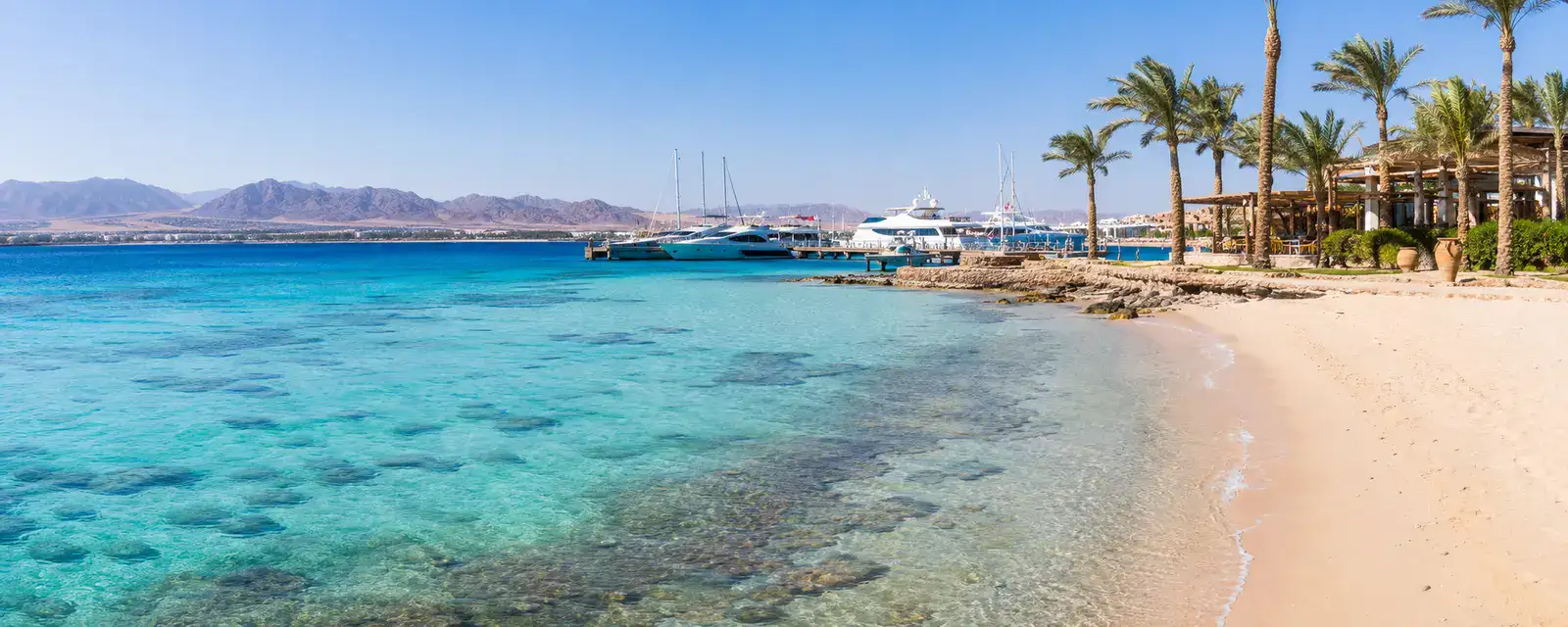 Turquoise Red Sea beach and marina in Hurghada Egypt