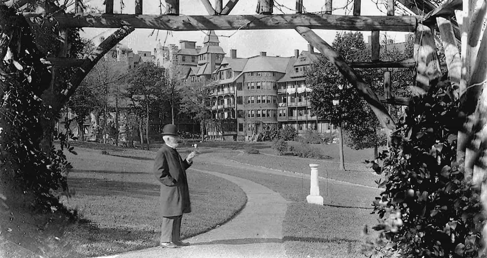 Albert Smiley Standing Outside of Mohonk Mountain House in 1910