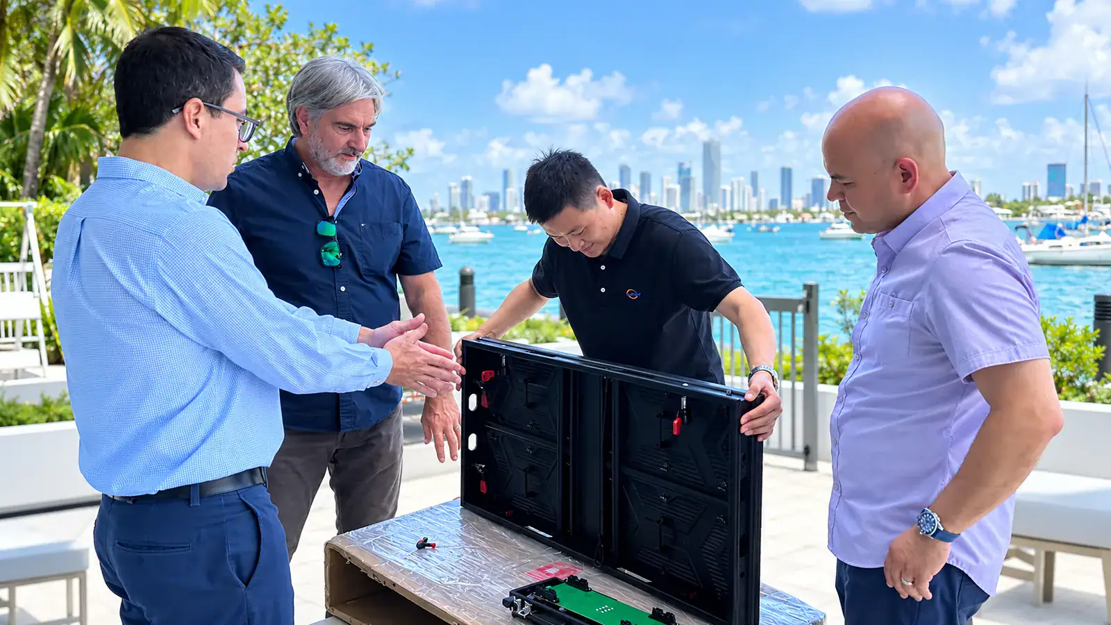 YUCHIP engineer discussing LED display cabinet specifications and project requirements with a client