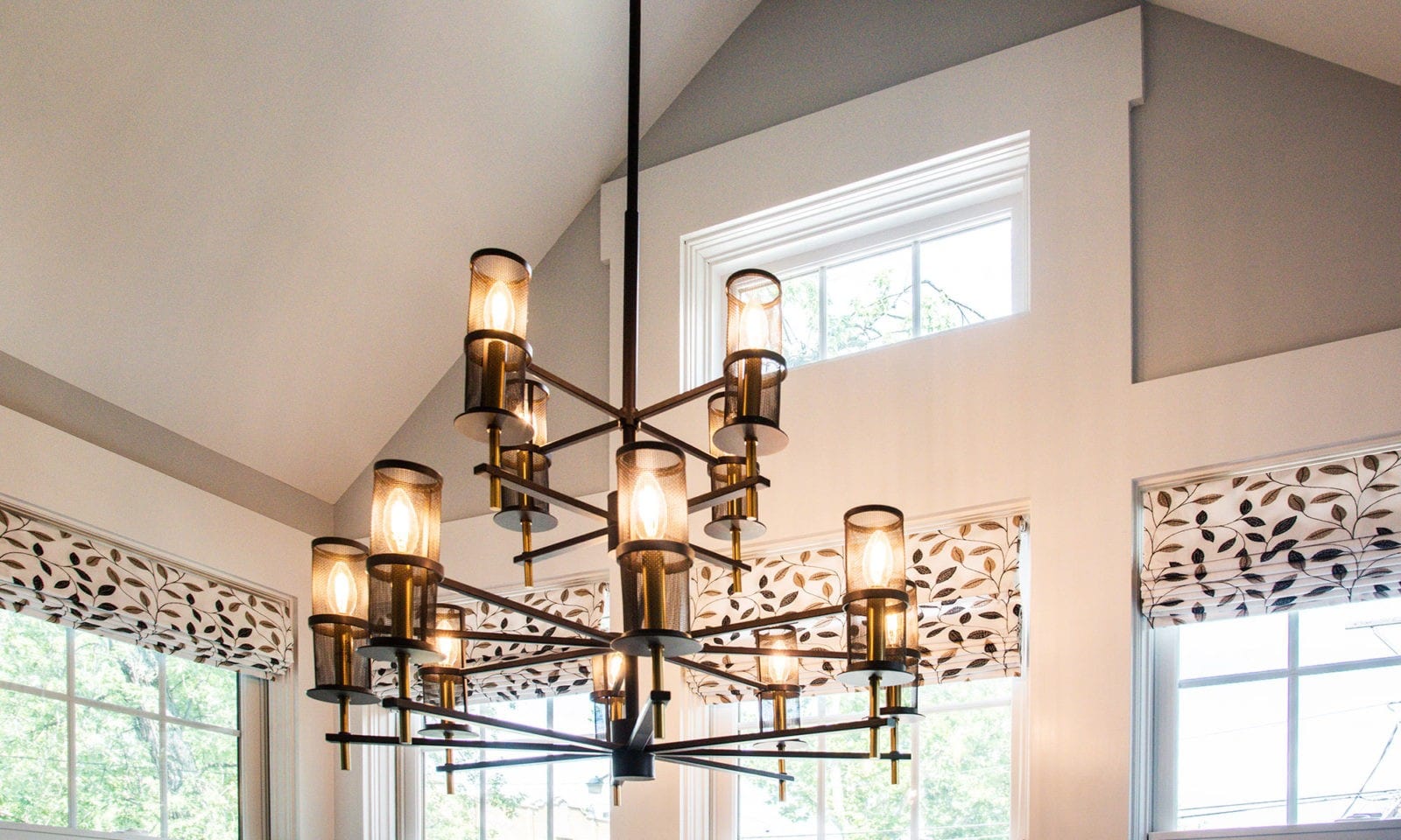 Closeup of a modern chandelier in a newly renovated kitchen