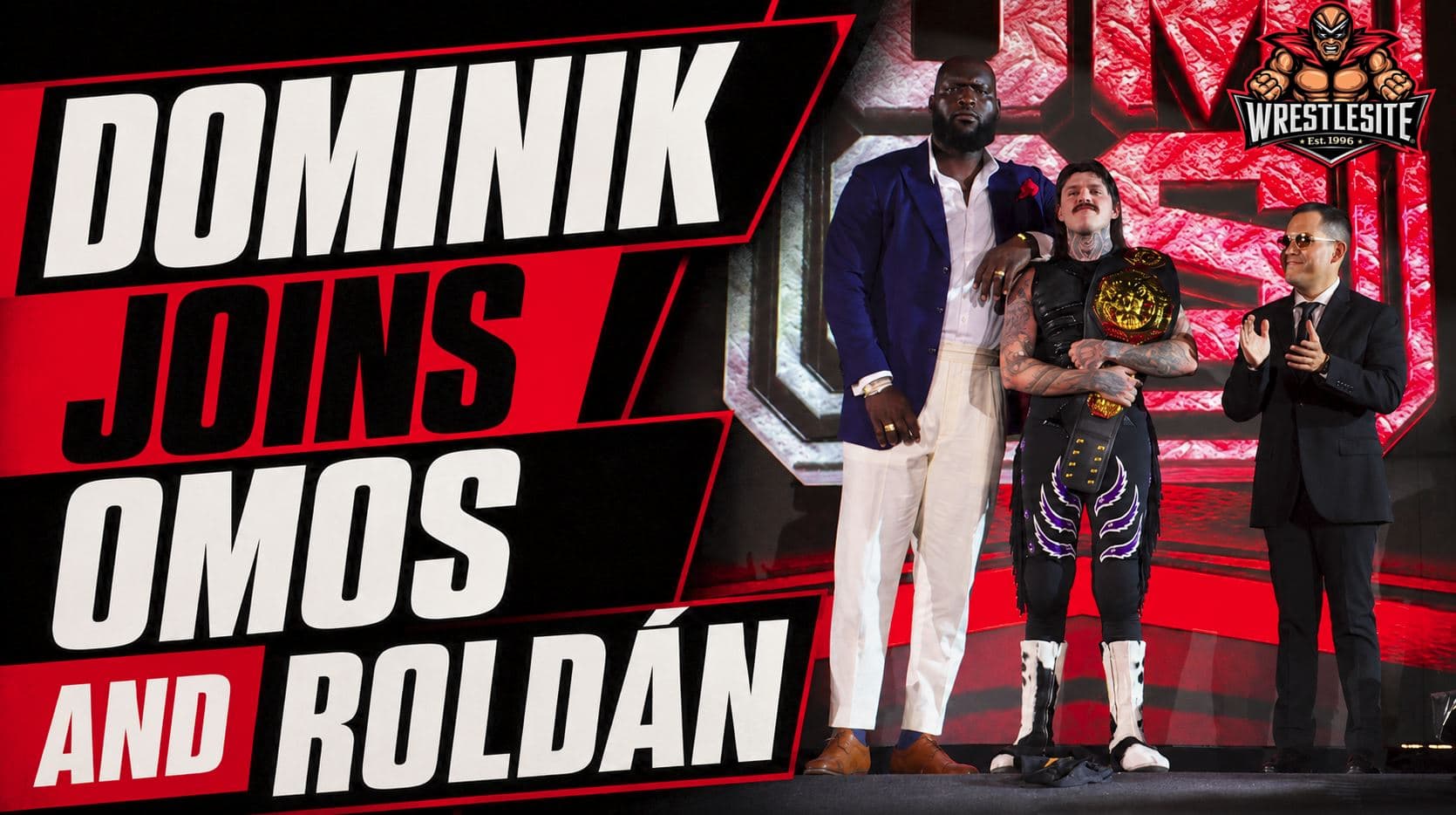 Dominik Mysterio stands beside Omos and Dorian Roldán after betraying El Grande Americano in AAA