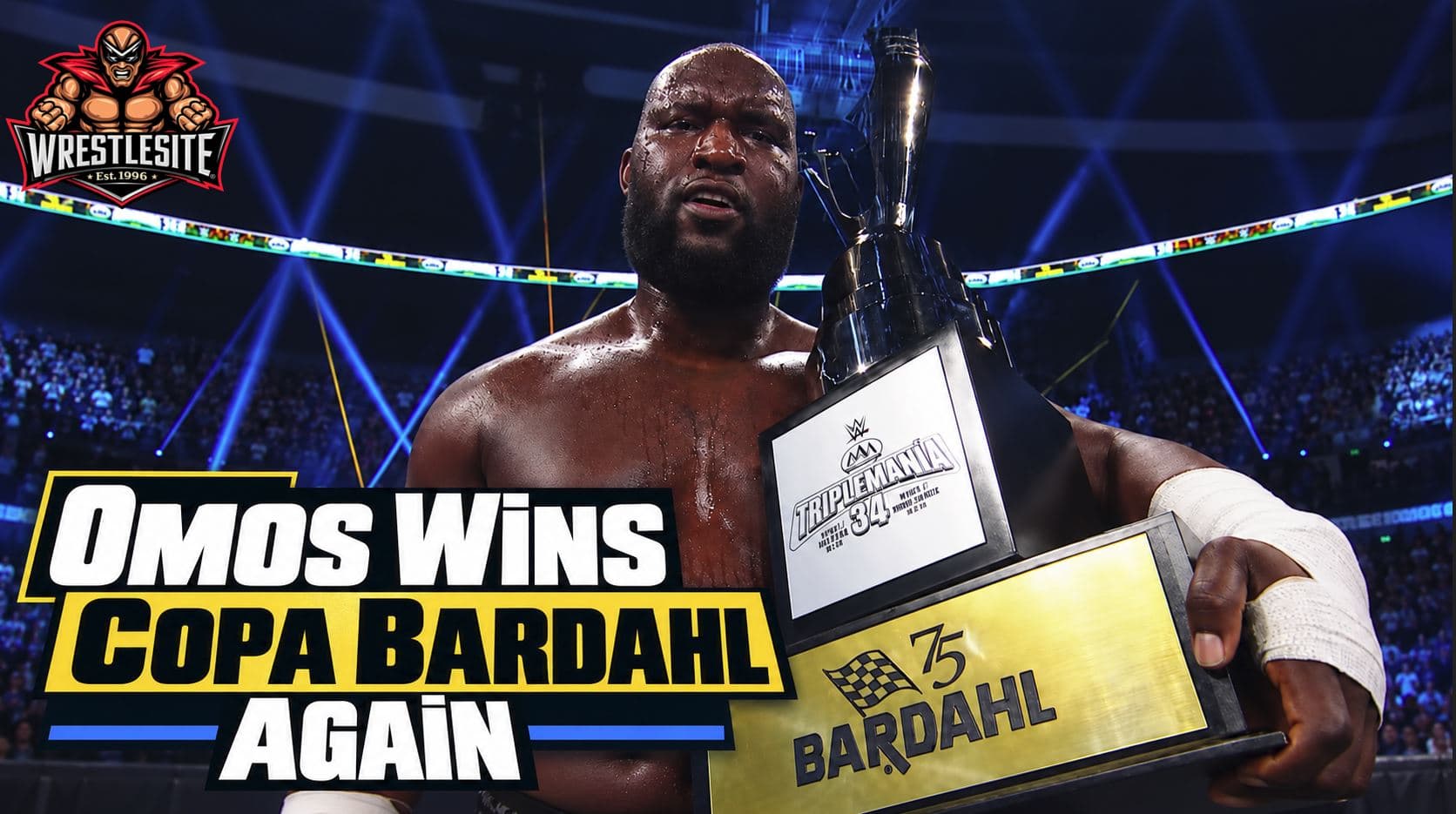 Omos raises the Copa Bardahl trophy after winning the 15-man match at AAA TripleMania 34