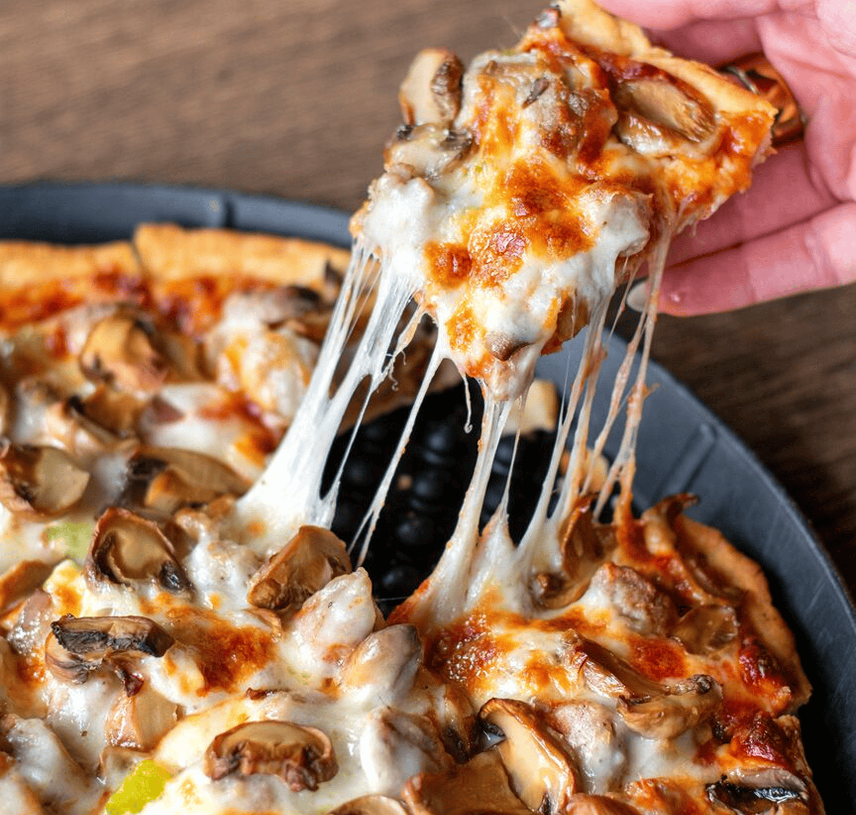 Image-Pizzas the 1947 pizza with a cheese pull