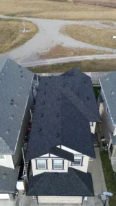 Aerial view of a new asphalt shingle roof on a Calgary home
