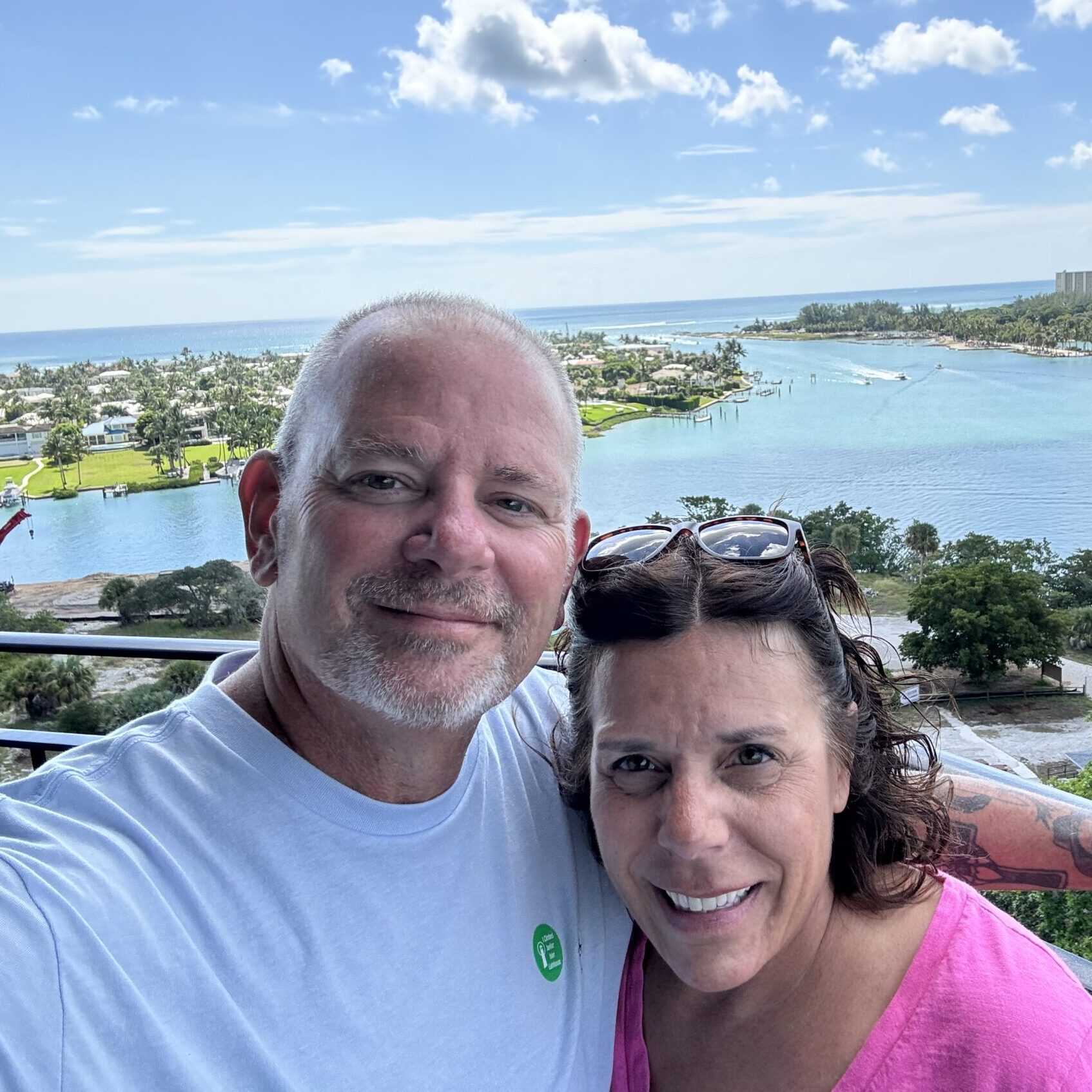 Relaxing vacation with Mike Fitzgerald enjoying a scenic harbor view.