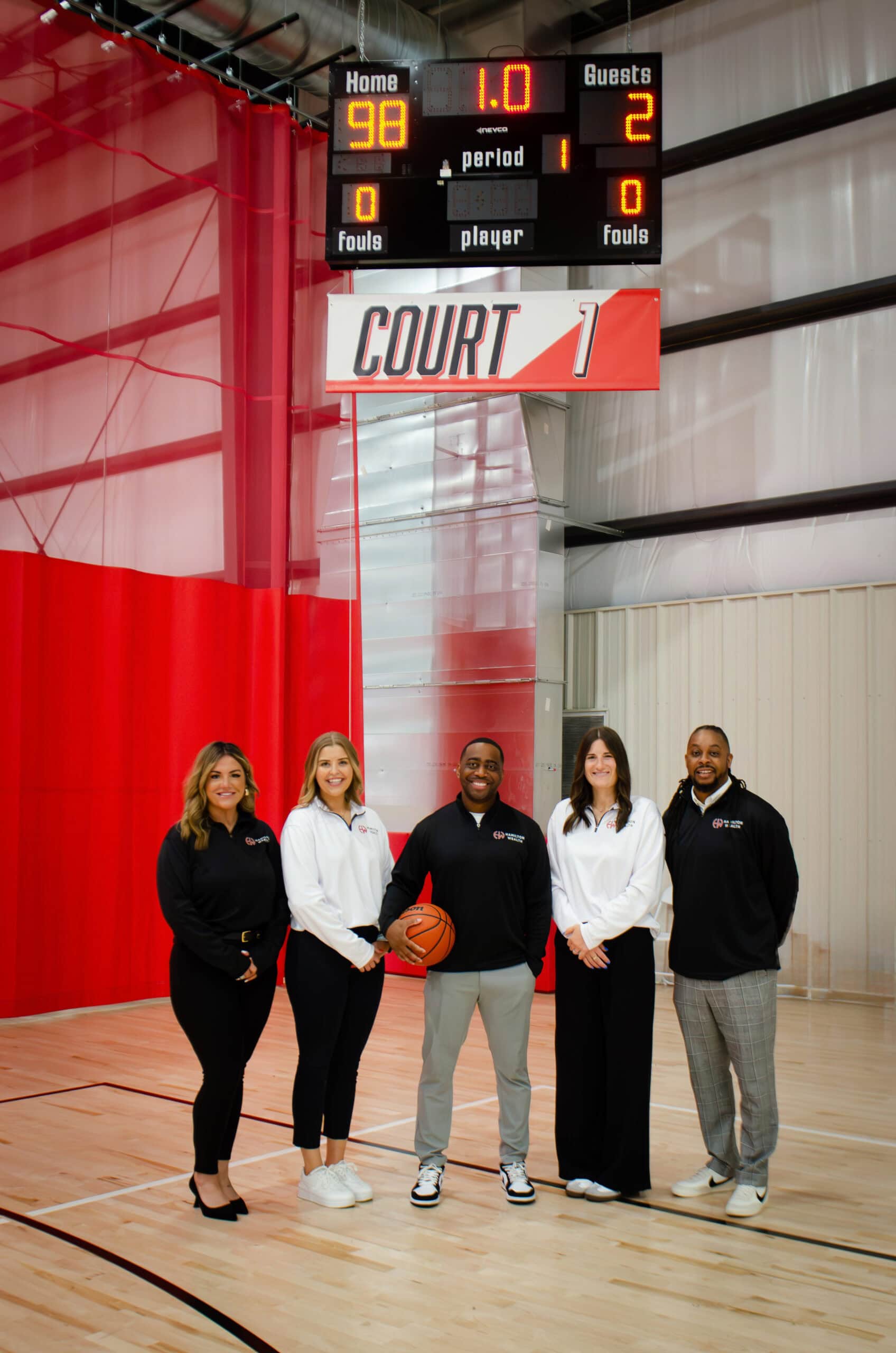 Hamilton Wealth Team Members on Basketball Court