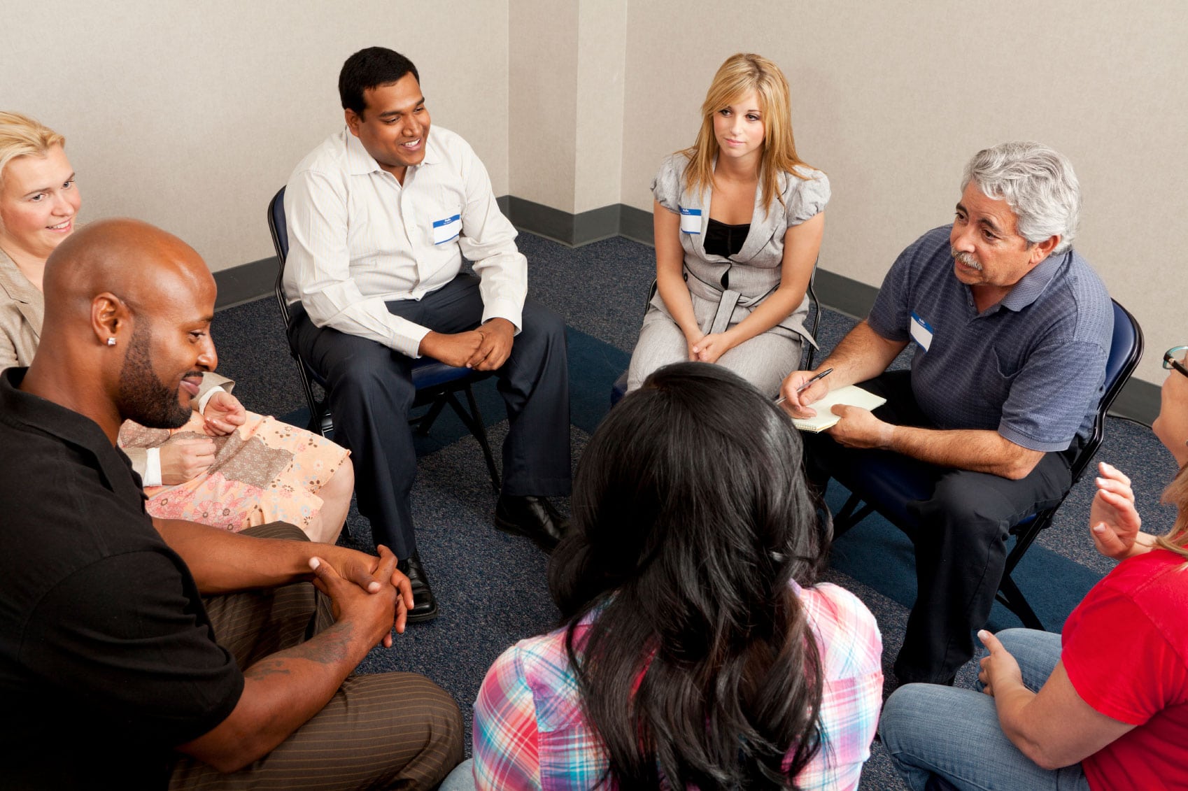 A Group of Participants Sitting on Chairs in a Circle for the CODAC Intensive Outpatient Program. A Group of Participants Sitting on Chairs in a Circle for the CODAC Intensive Outpatient Program.