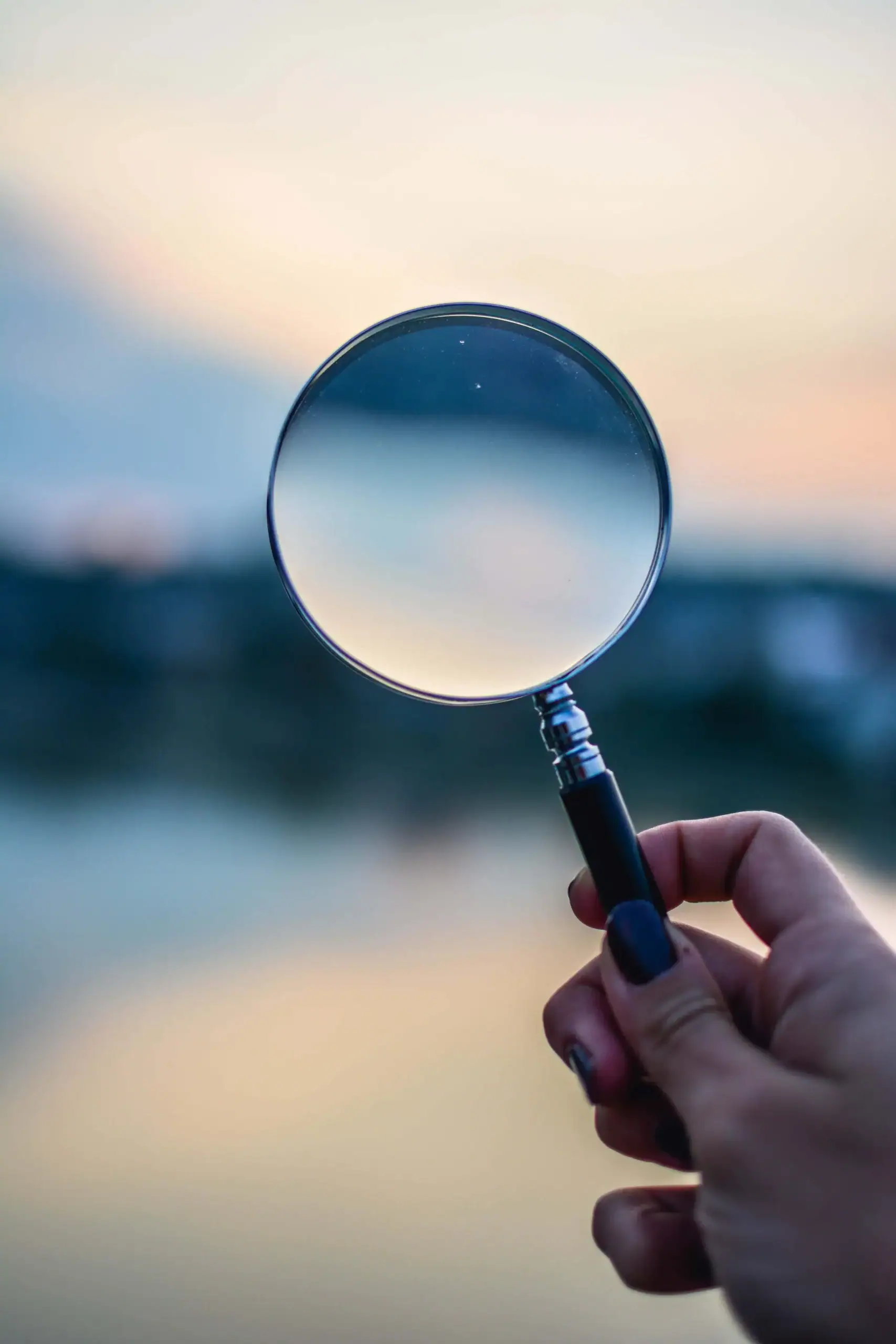 Magnifying glass representing getting curious in somatic therapy in ann arbor