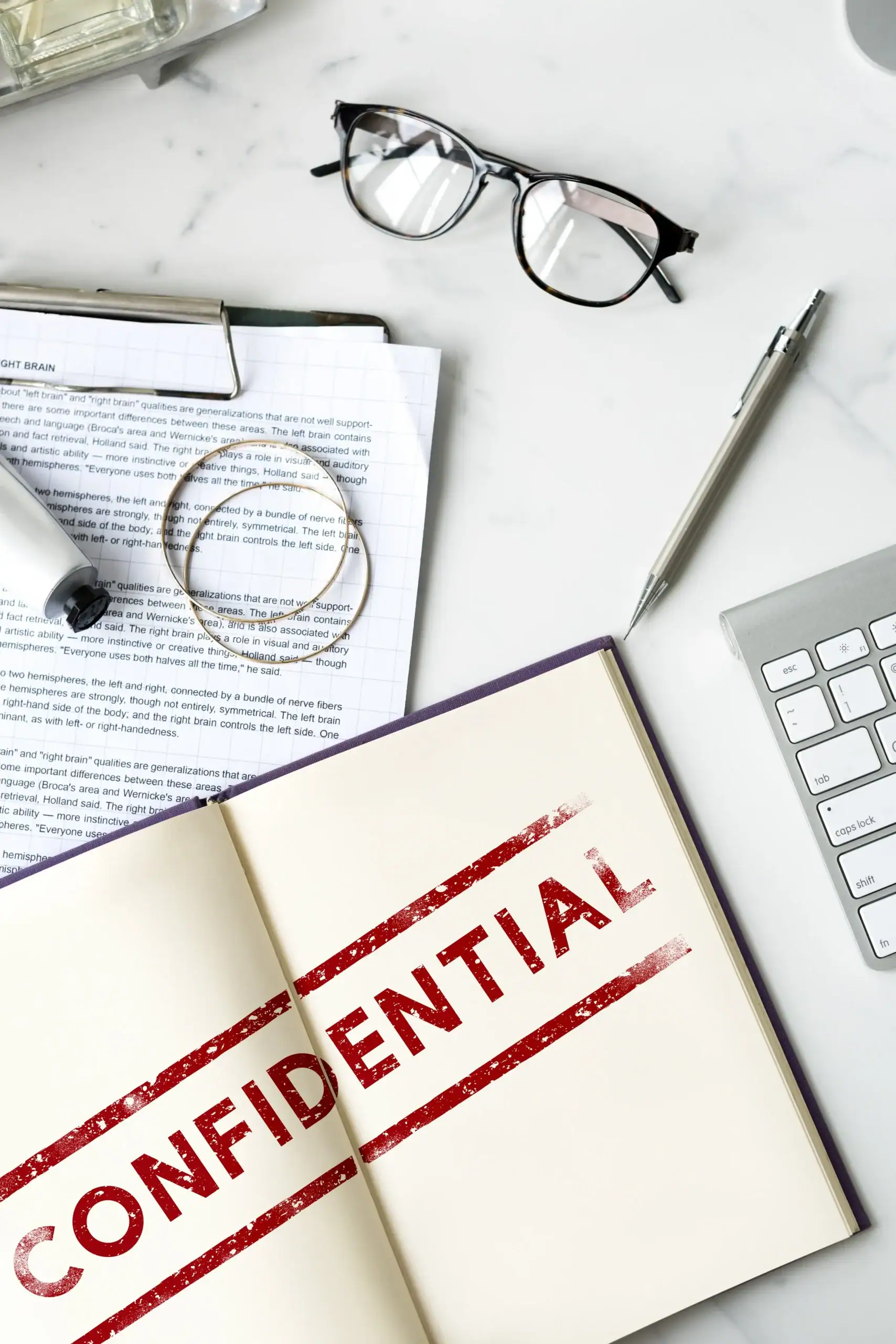 Picture of a book with the words confidential that represent that the suicide hotline is confidential