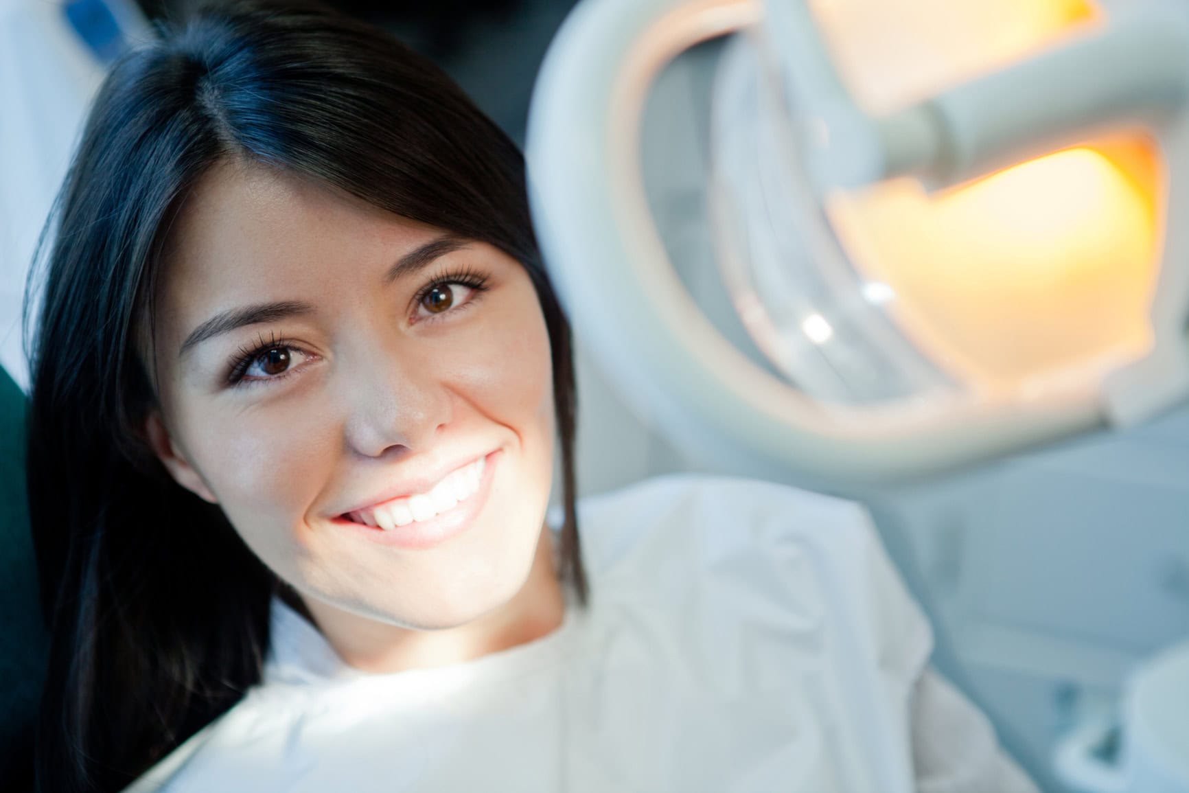 Woman receiving dental care at the dentist office