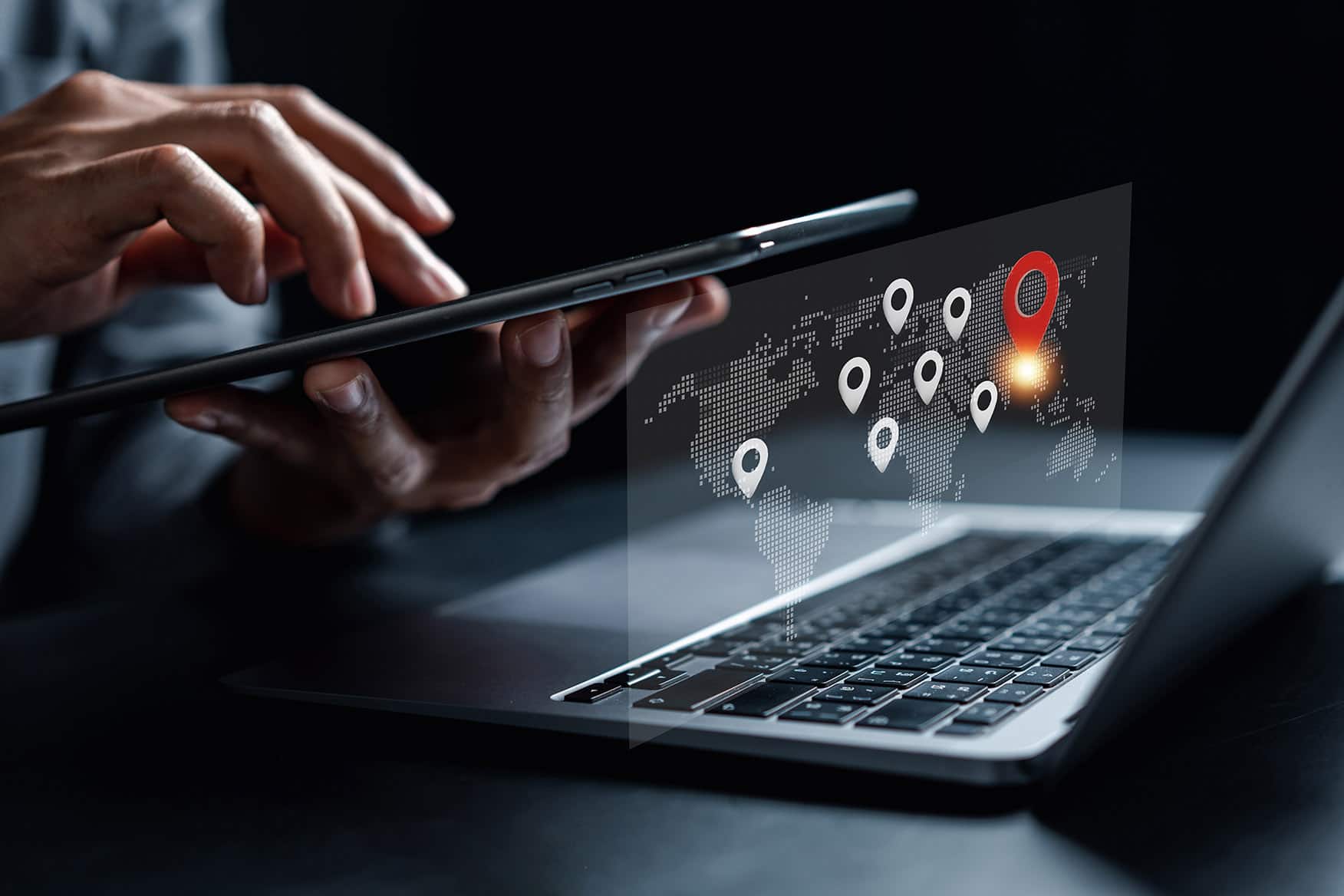 Businessman using smartphone synchronize computer searching world map with location point, GPS app, Destination travel maps and find places in the online system, searching by satellite system. Businessman using smartphone synchronize computer searching world map with location point, GPS app, Destination travel maps and find places in the online system, searching by satellite system.