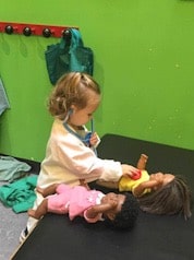 toddler in doctor dress up