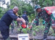 Menyatu Dengan Alam, Satgas TMMD Tanam Pohon di Kampung Pigapu