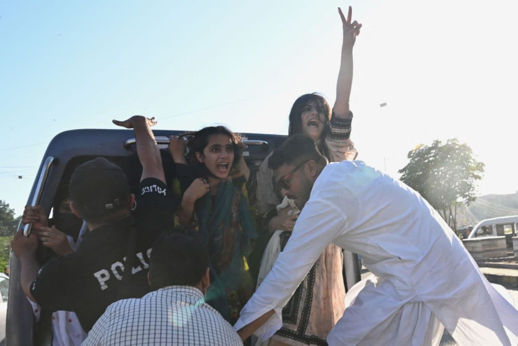 Police detain activists from Baloch Yakjehti Committee (BYC) and civil society during a protest demanding the release of Mahrang Baloch, one of Pakistan's most prominent human rights advocates, along with missing Baloch persons, in Karachi on March 24, 2025. Photo by ASIF HASSAN/AFP via Getty Images.