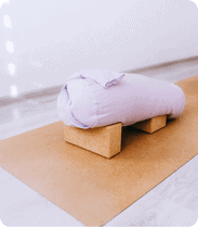 Bolster for yoga postures in 100 hour yoga TTC in Rishikesh