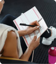 Notebook and pen for journaling in 100 hour yoga TTC Rishikesh