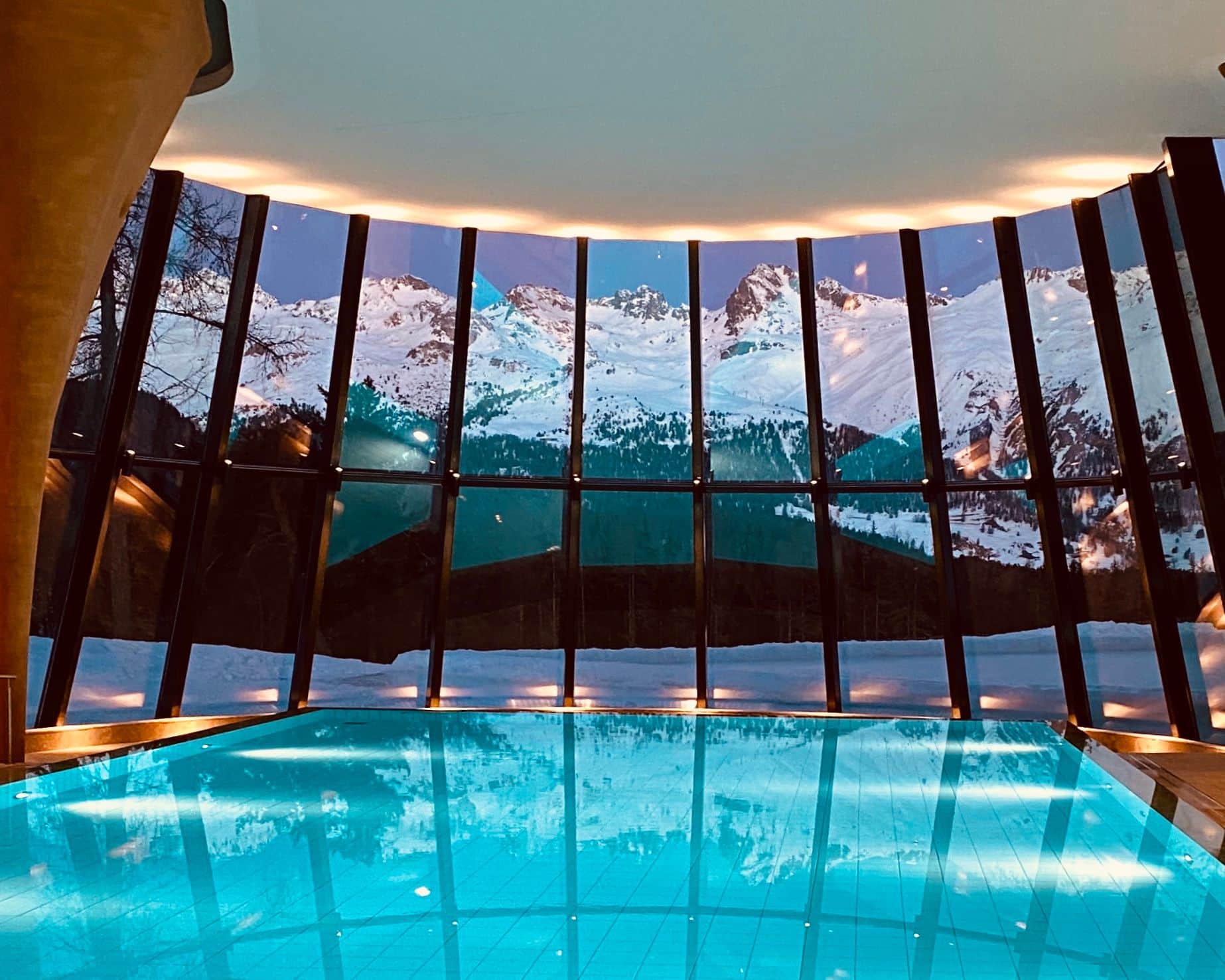 Grand Kronenhof ski resort in Switzerland. Pool with views onf the snowy mountains.