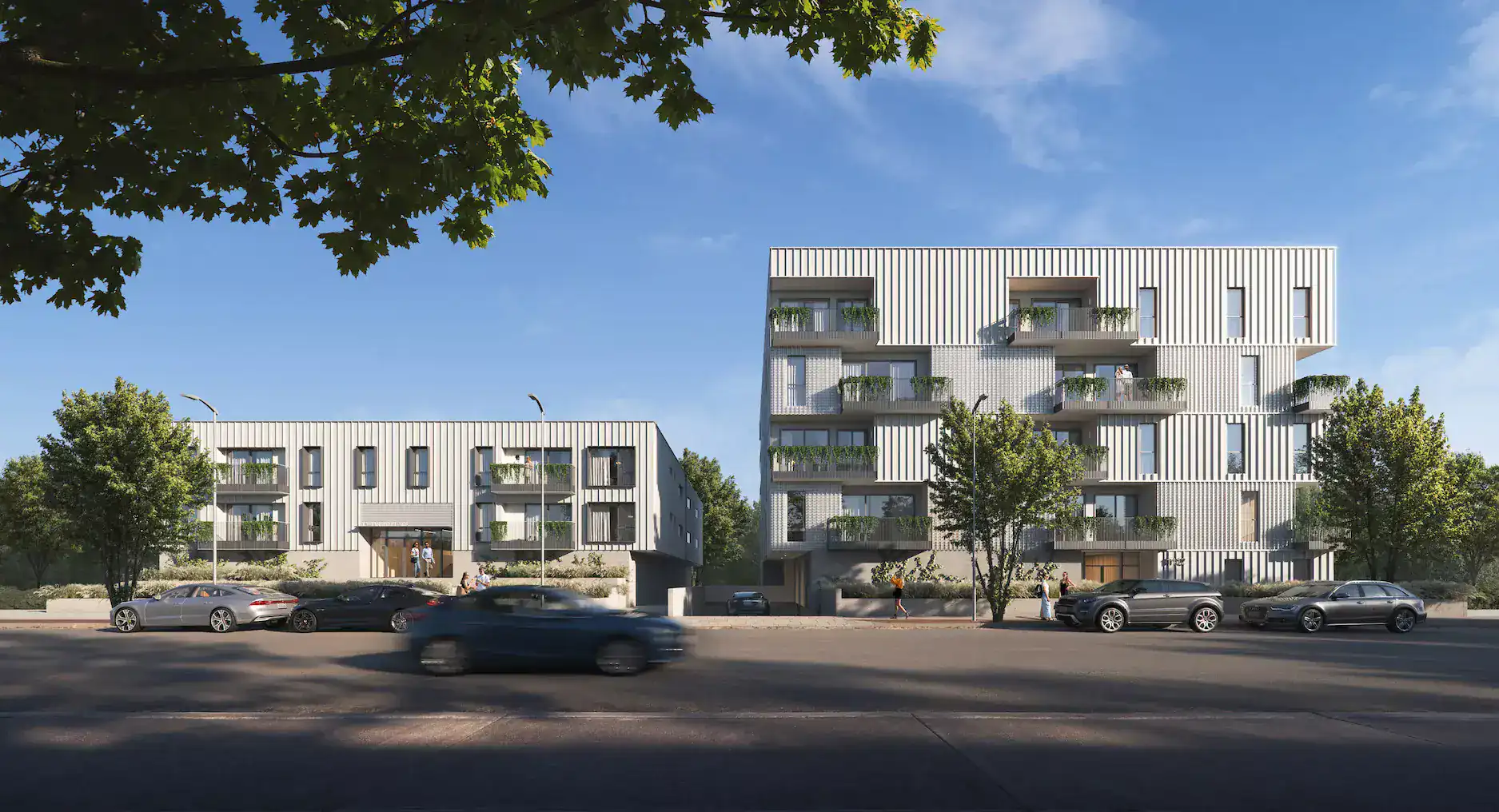 Contemporary residential apartment buildings with modern architectural design and green balconies.