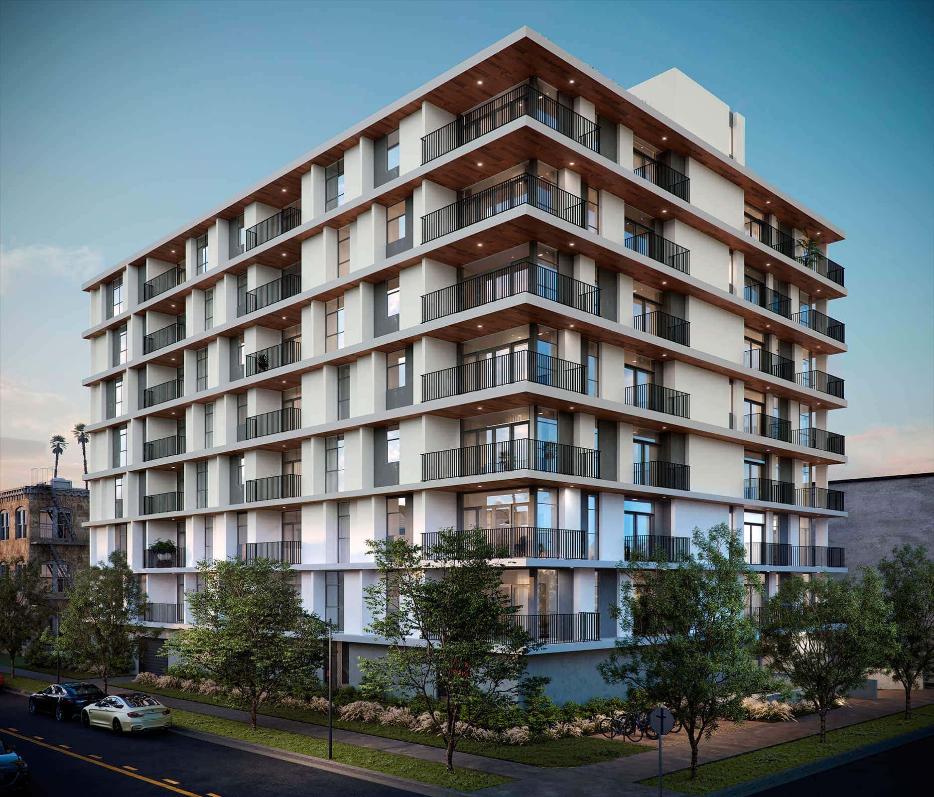 Modern residential apartment building with spacious balconies and contemporary design.