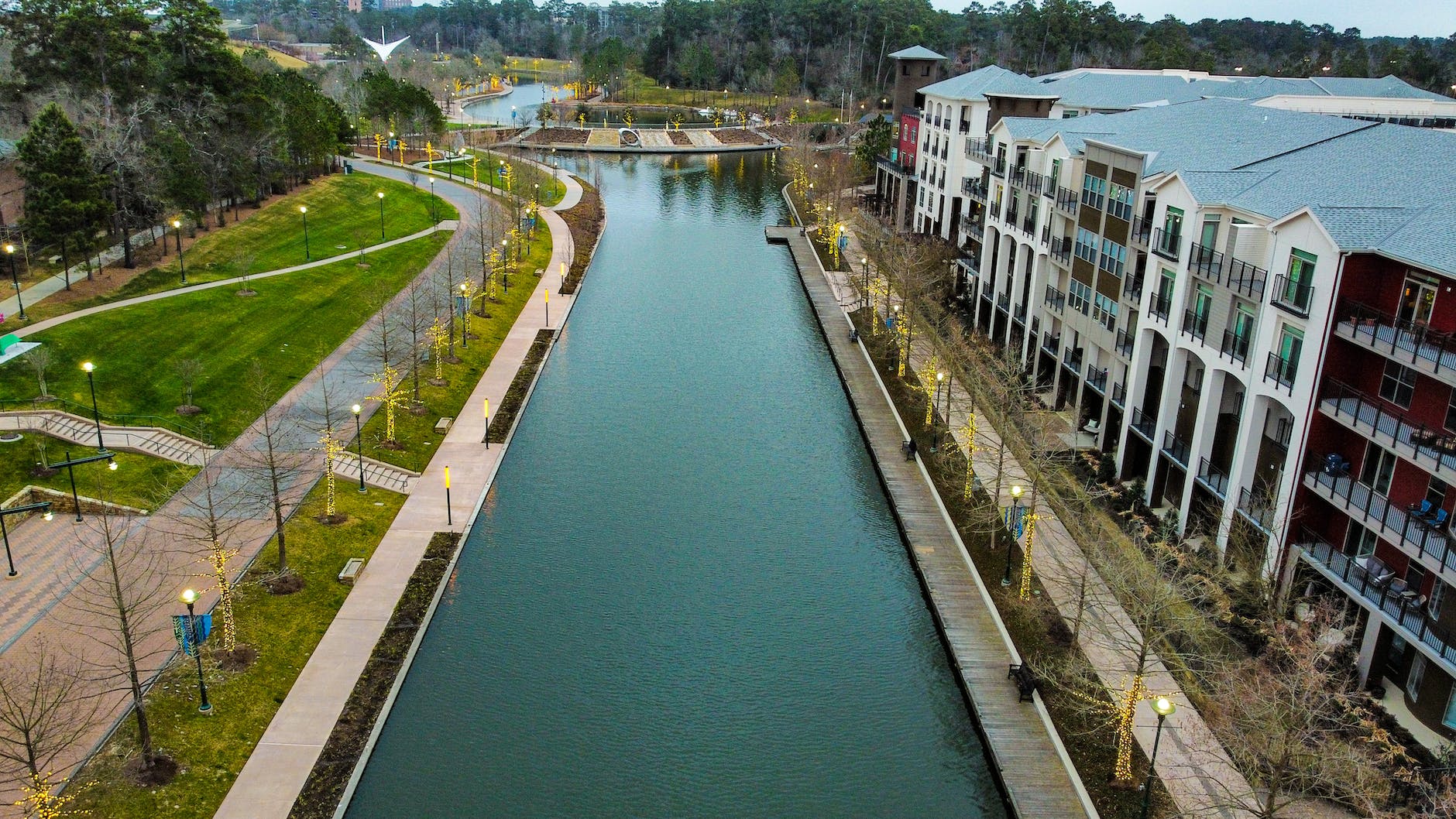 apartment buildings along the riverbanks. Celebrating World Urbanism Day