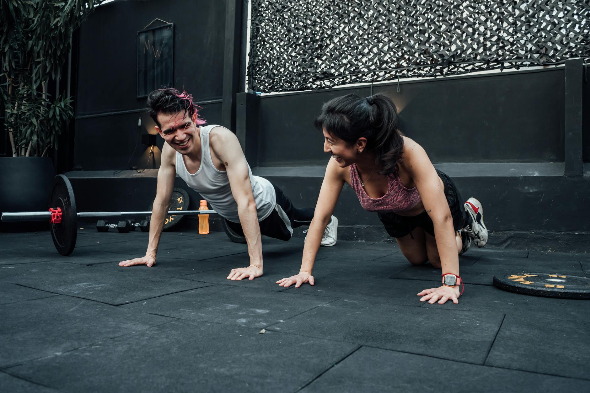 two people doing pushups