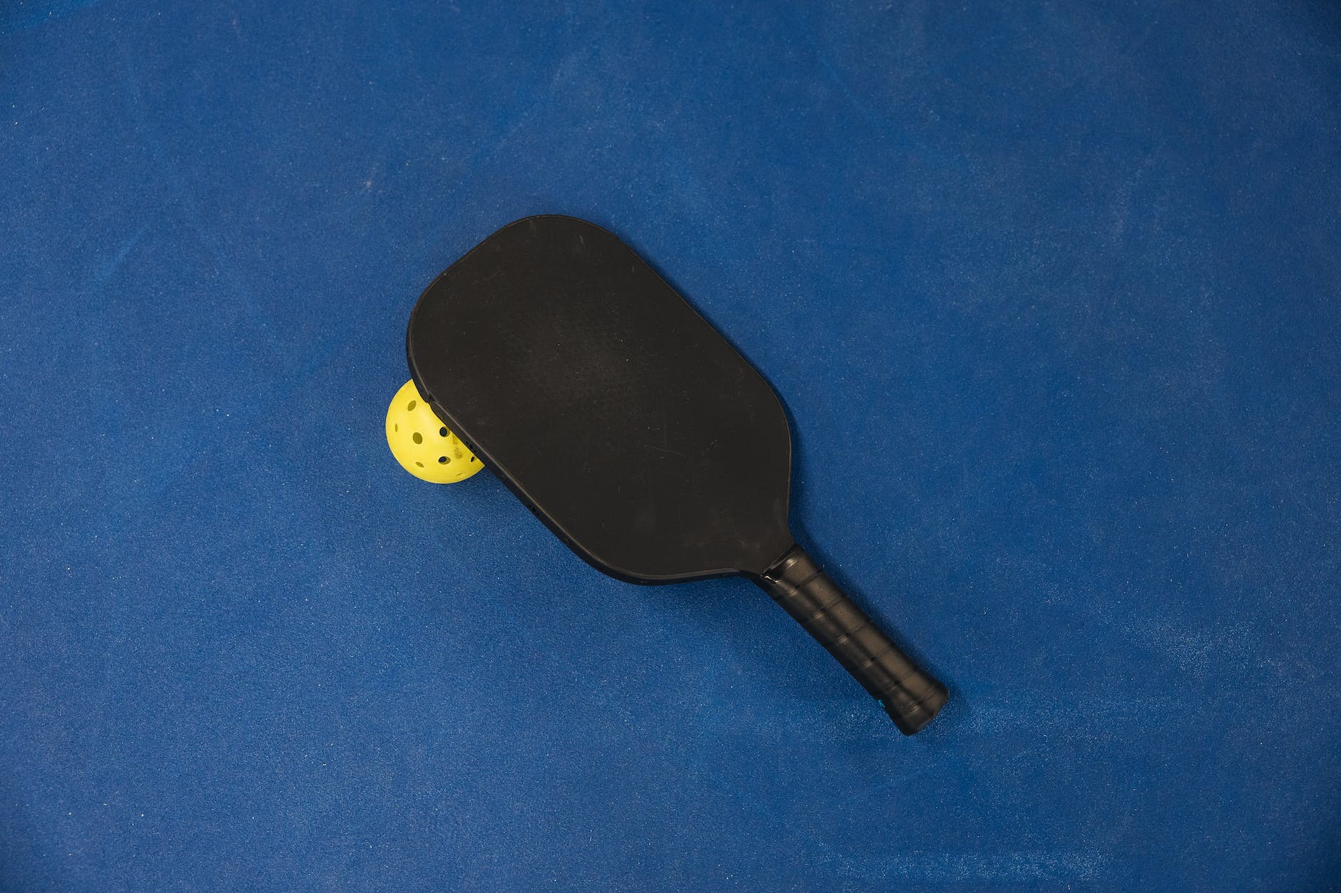 pickleball paddle ball court. Matthew Perry.