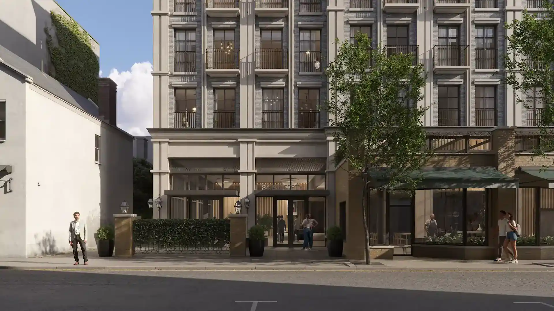 Hotel building with modern classic architectural style, grey brick façade, large windows, and balconies, landscaped ground floor entrance, ambient lighting.