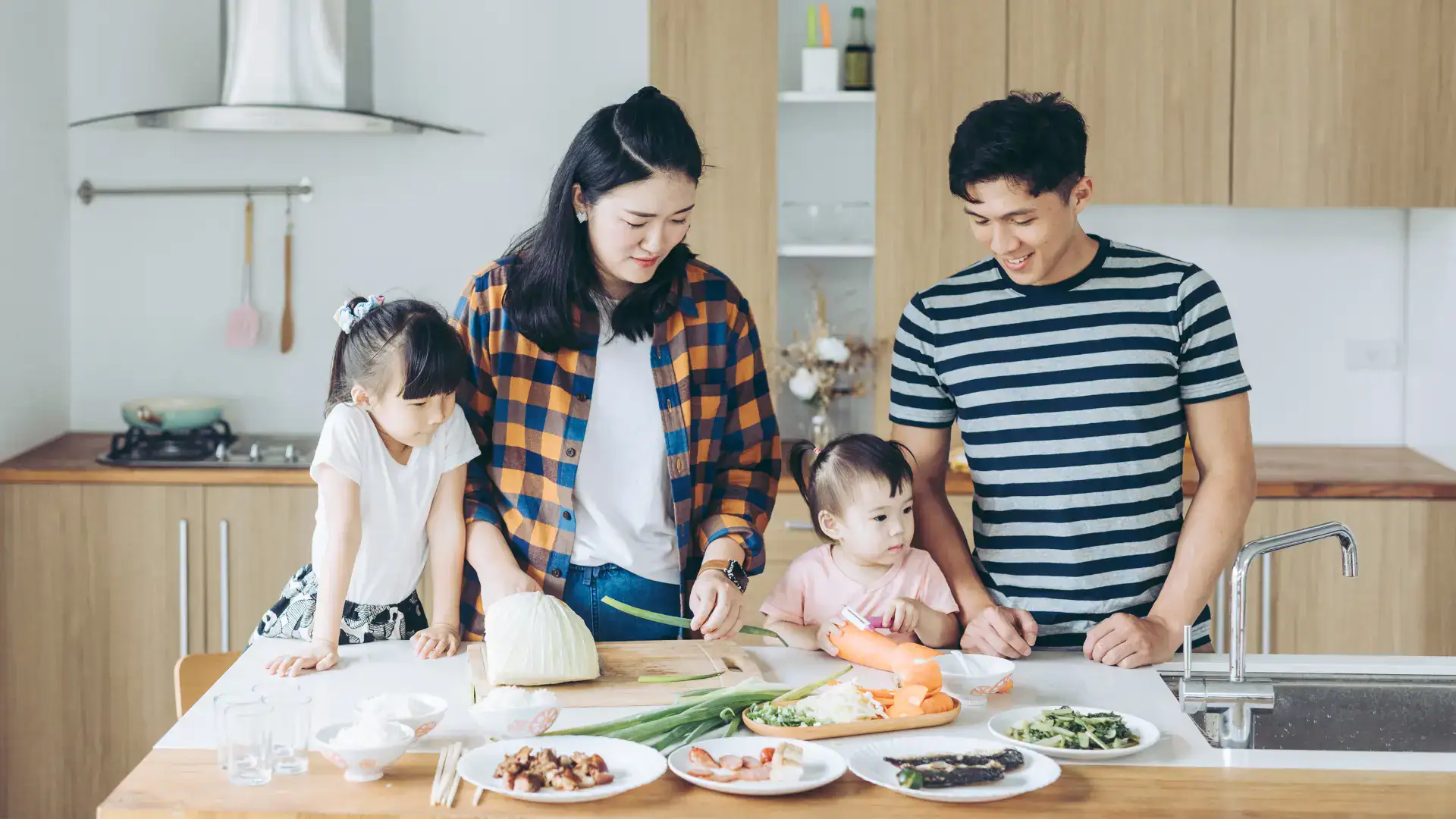 A family makes dinner together