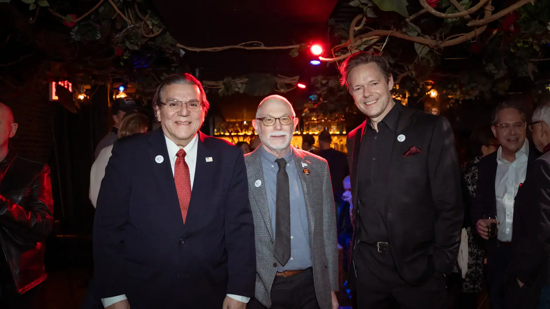 4A Arts Board Chair Luis Cancel (L) and Executive Director Gavin Lodge (R) pose with Sebastian Scripps at the "Salute to Charlie Reinhart"