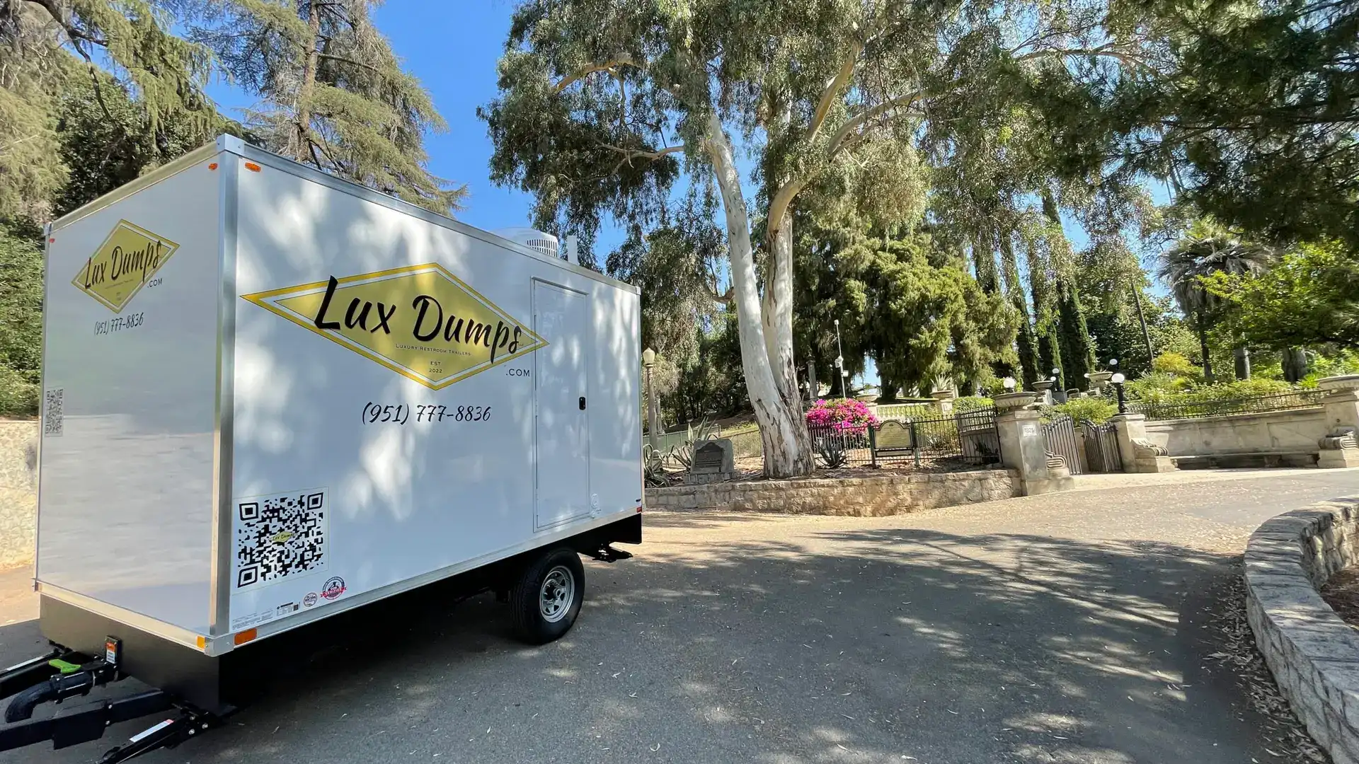 Interior of a Lux Dumps luxury restroom trailer showing premium finishes