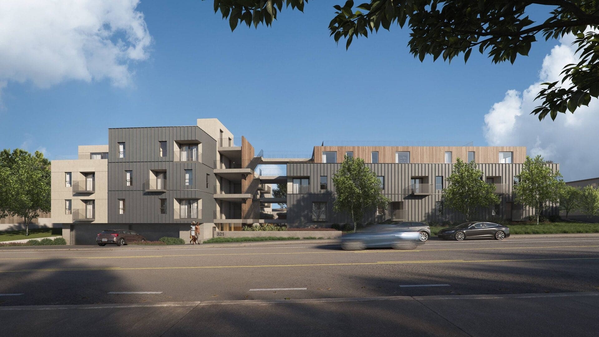 Contemporary multi-story residential building with modern architectural design and landscaped outdoor space.